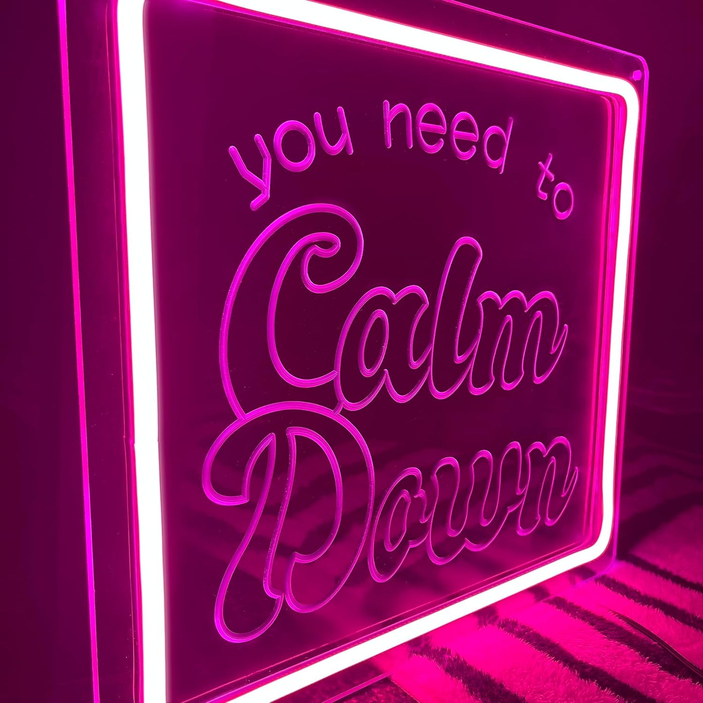 Pink "You Need To Clam Down" Neon Sign