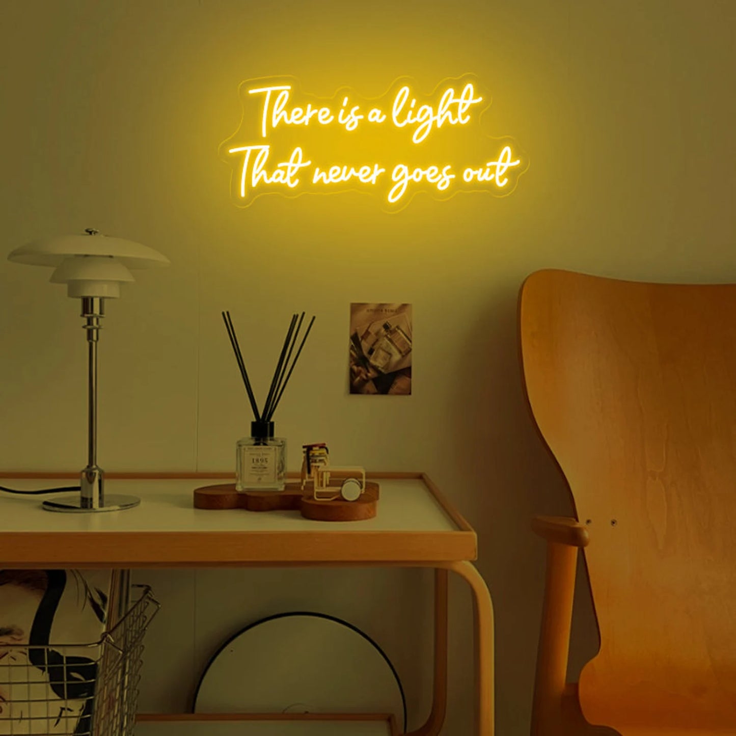 "There is a light that never goes out" neon sign